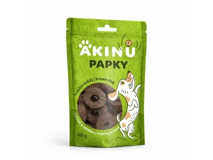 Packshot Akinu PAPKY Kroužek hnědý pamlsek pro psy 100 g (174030) na bílém — natočení sjednocené podle vzoru 174027 (řada Papky).