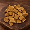 Surovina 282041 Akinu SUPRIMO SELECTION Mobility 75 g (kuřecí) – hromádka na tmavém prkénku, kategorie pamlsek psi (p3 ze 4)